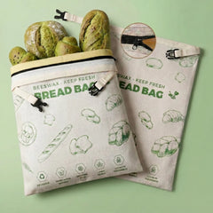 Green reusable beeswax bread bags with bread pattern for keeping homemade bread fresh