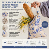 Blue floral reusable bread bag with fresh baguette and cotton linen fabric design for eco-friendly bread storage
