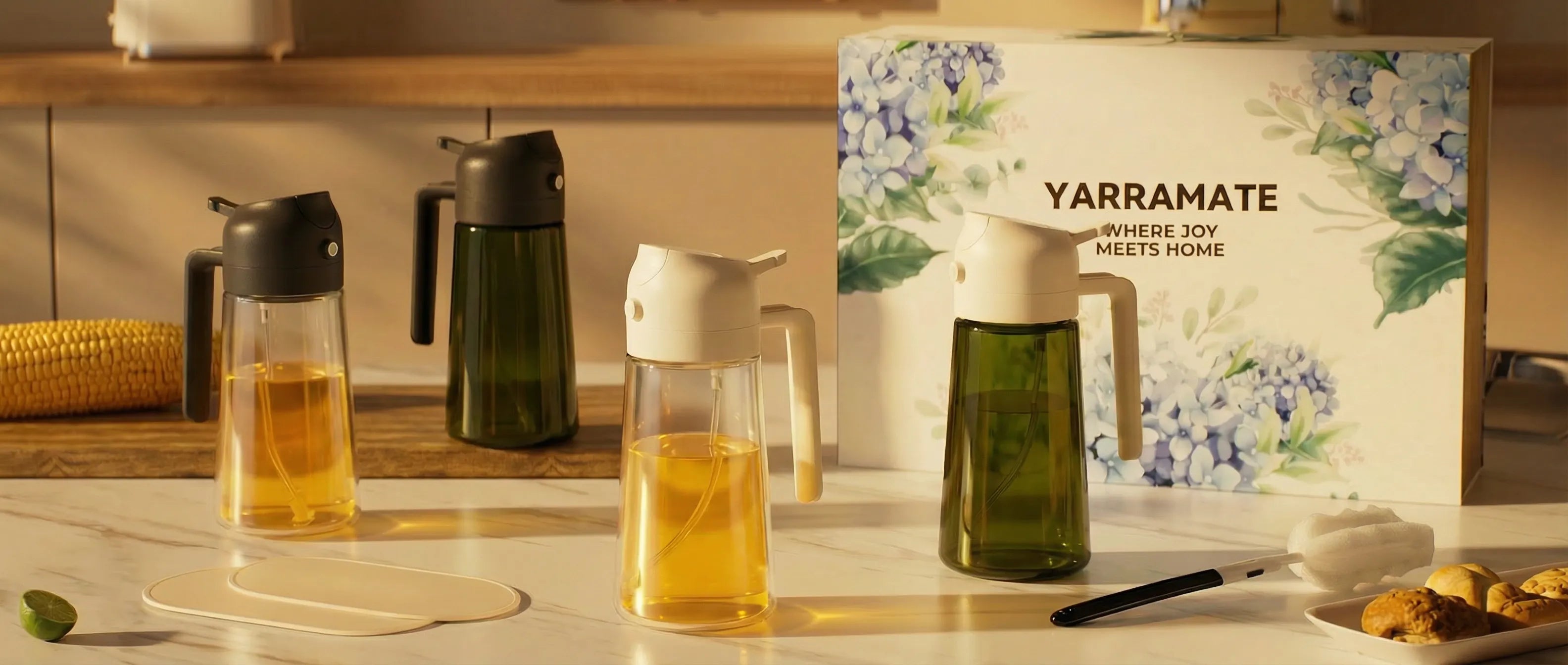 YARRAMATE oil sprayer set displayed in kitchen with multiple glass oil bottles and gift box packaging