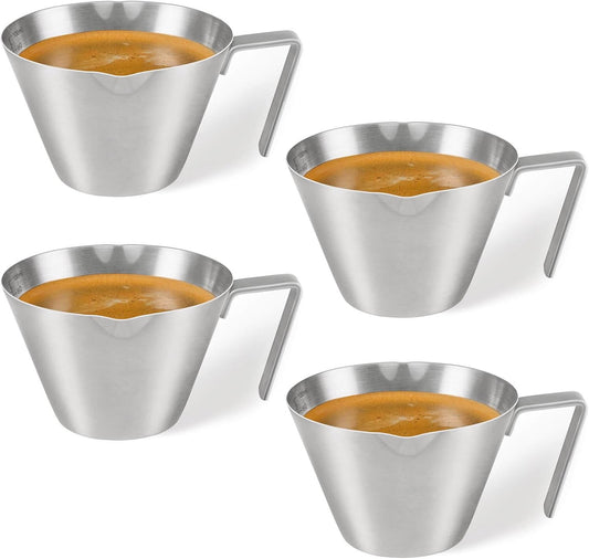 Four stainless steel espresso cups filled with coffee
