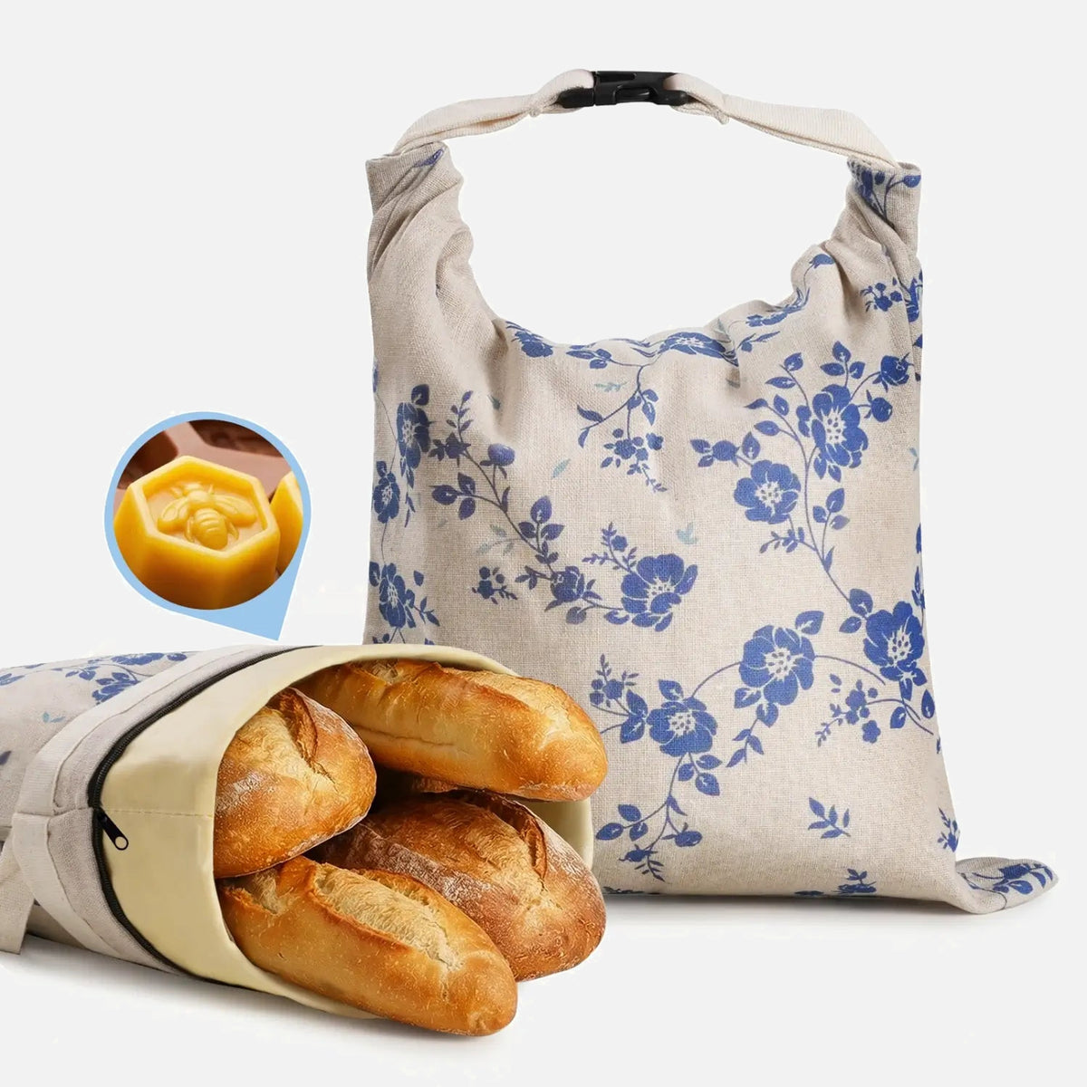 Two blue patterned reusable beeswax bread bags with zippers.