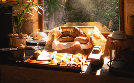 Homemade bread stored in a reusable bread bag in a warm and humid kitchen
