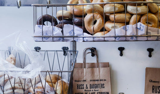 Bread stored in a clear plastic bag for a bread bag versus plastic comparison