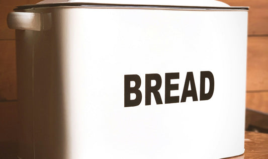 Closed countertop bread box in a kitchen used for bread storage
