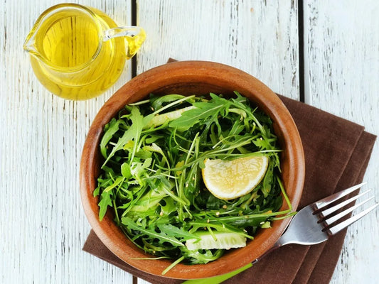 Homemade salad with olive oil for lighter portion-controlled dressing
