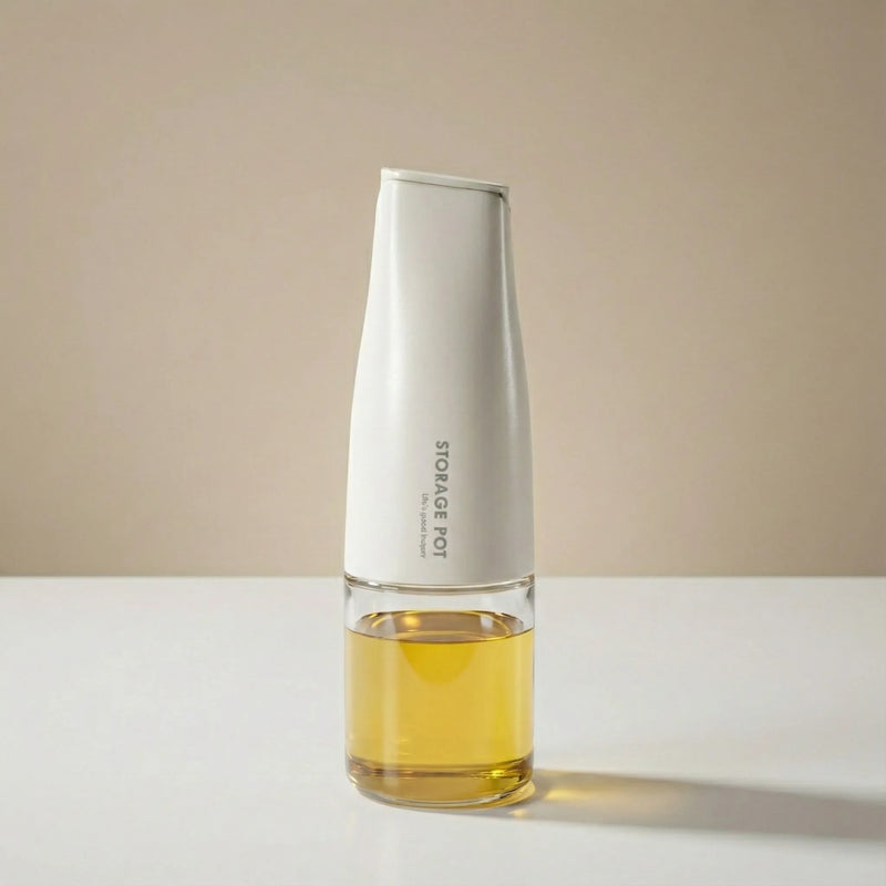 Elegant glass oil sprayer for healthy cooking in a modern minimalist kitchen