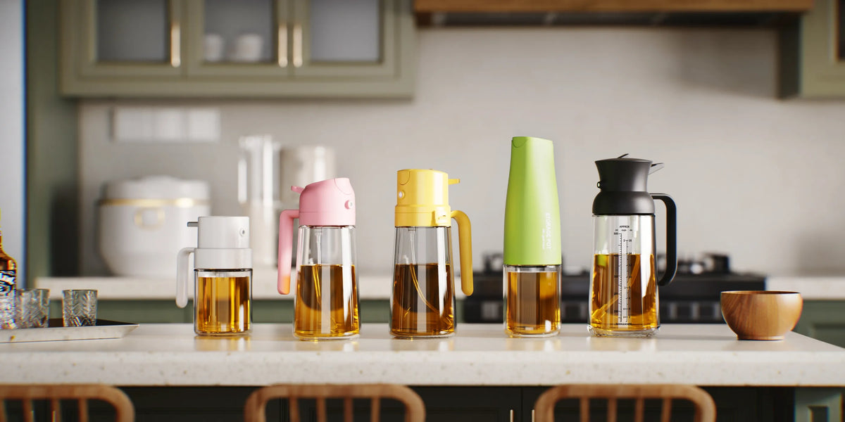 alt="2-in-1 oil sprayer bottles on kitchen counter for air fryer, salad dressing, and healthy low-oil cooking"