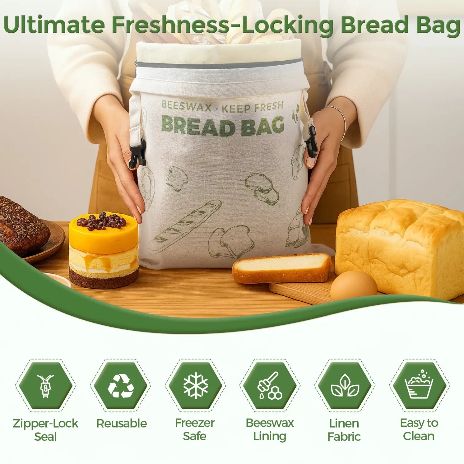 A person holds a reusable beeswax bread bag with a zipper-lock seal, featuring a design of various bread types, while a loaf of bread and baked goods sit on a table. The bag is made of linen fabric and promotes sustainable food storage.#Green