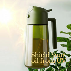 Green glass kitchen oil dispenser designed to shield olive oil from sunlight