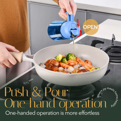 Blue glass cooking oil dispenser bottle  pouring olive oil into a wok with seafood and vegetables