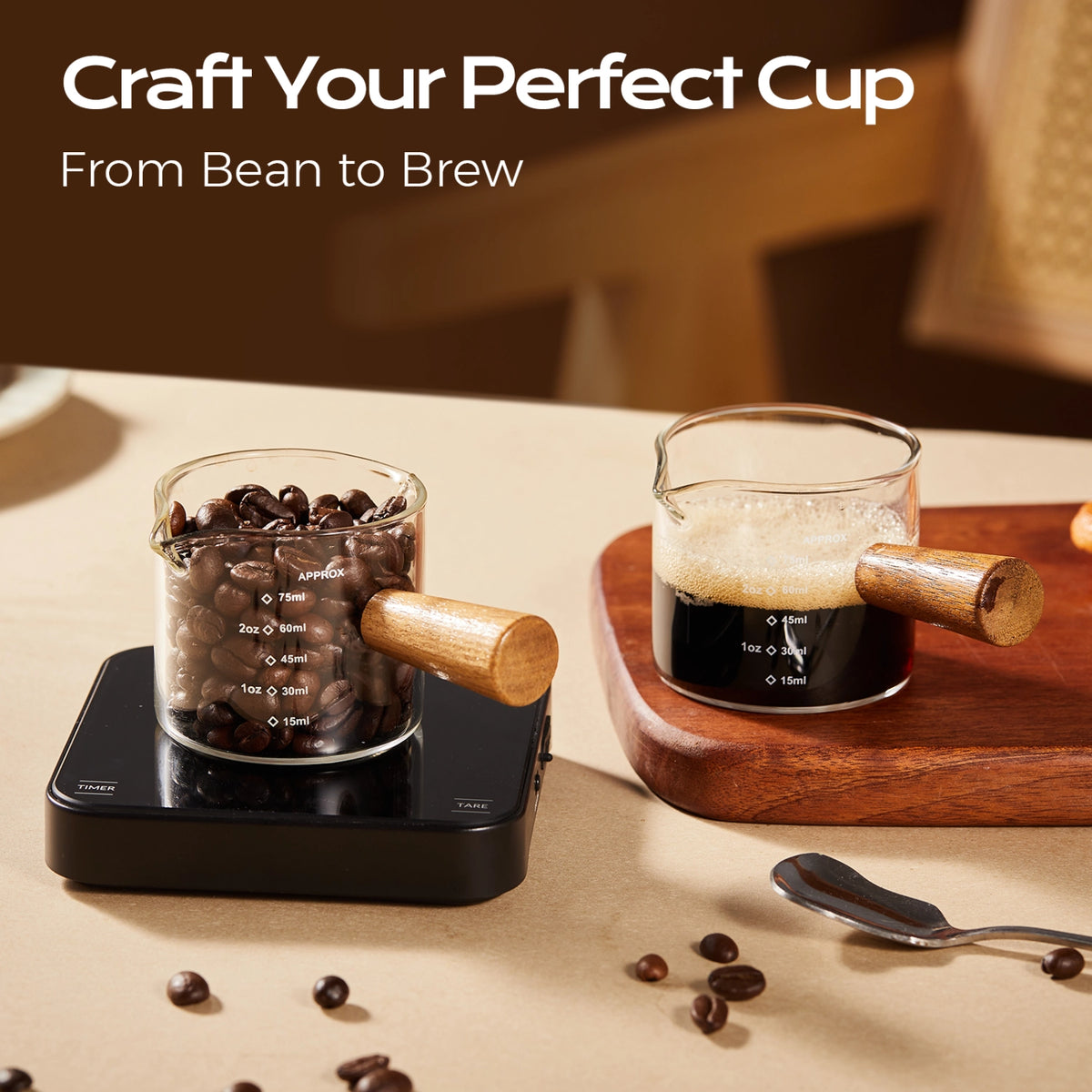 Wooden-handle glass measuring cups holding coffee beans and espresso, with one cup on a digital scale.