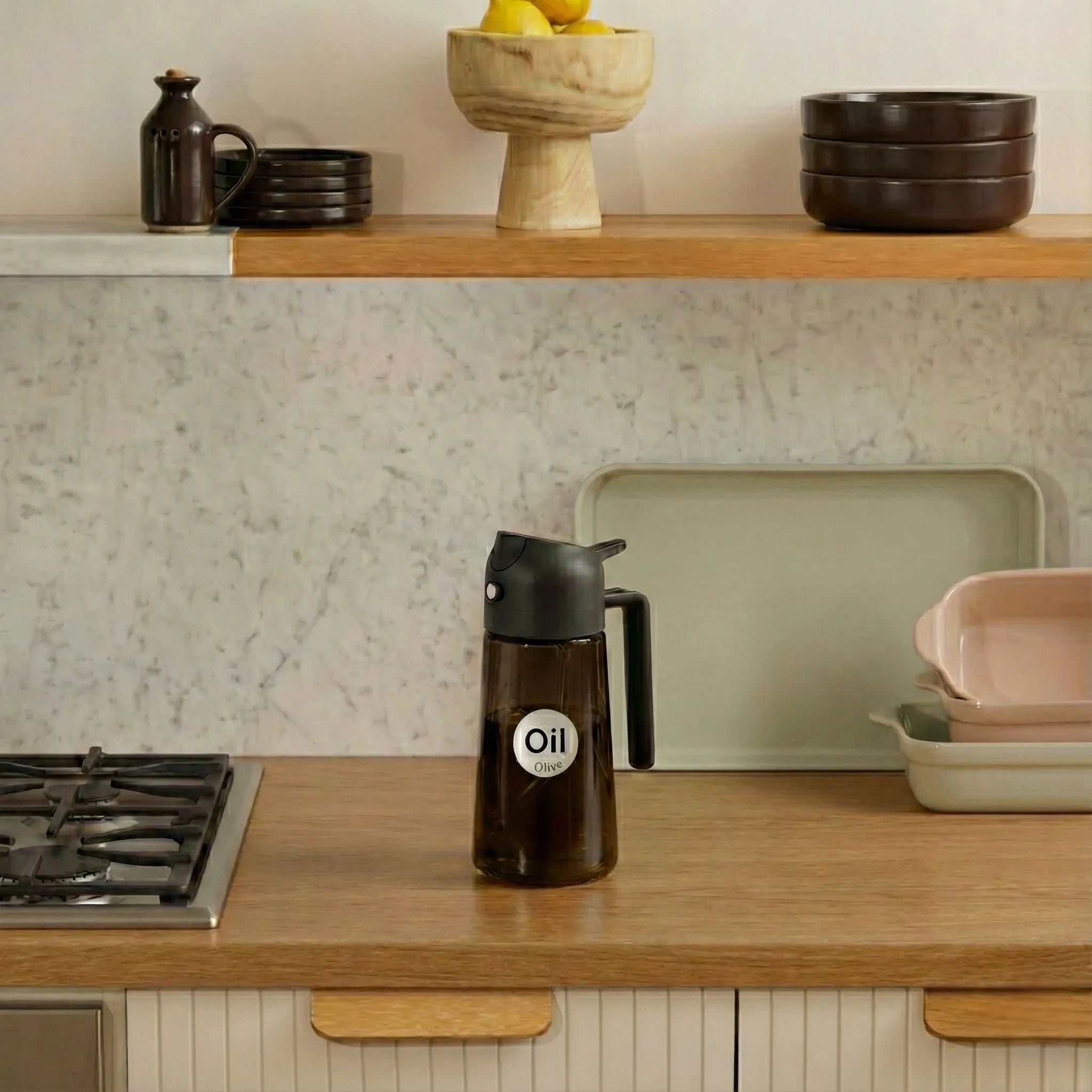 dark brown oil sprayer on the kitchen table