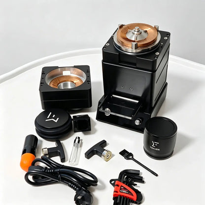 A close-up of a 98mm red copper coated flat burr mechanism inside a disassembled single dose electric grinder