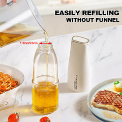 Easily refilling cooking oil into the wide mouth white olive oil glass bottle without a funnel