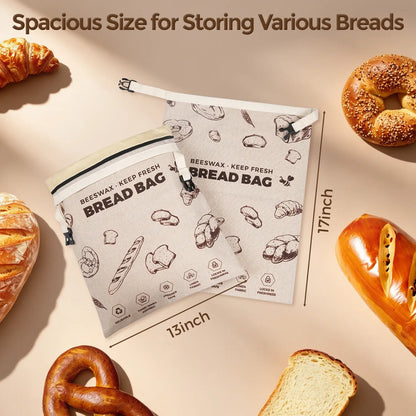 A beeswax bread bag set featuring two sizes, one measuring 13 inches and the other 17 inches, is displayed against a backdrop of various types of bread, including baguettes and rolls..#Brown