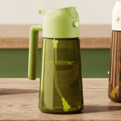 yarramate dark glass oil dispenser with green lid