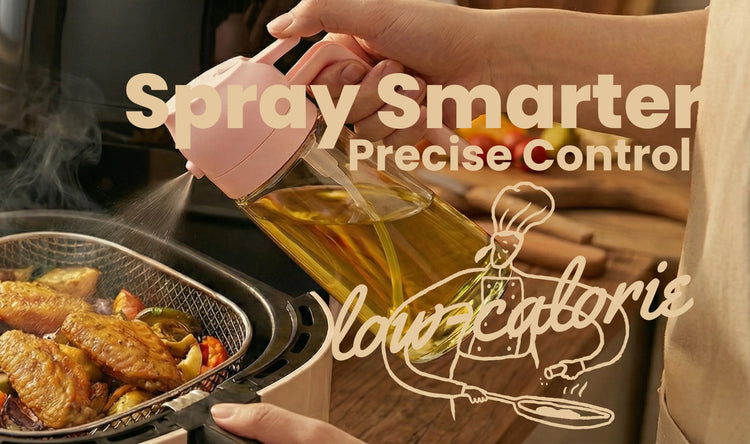 Oil sprayer spraying olive oil evenly over food in an air fryer basket