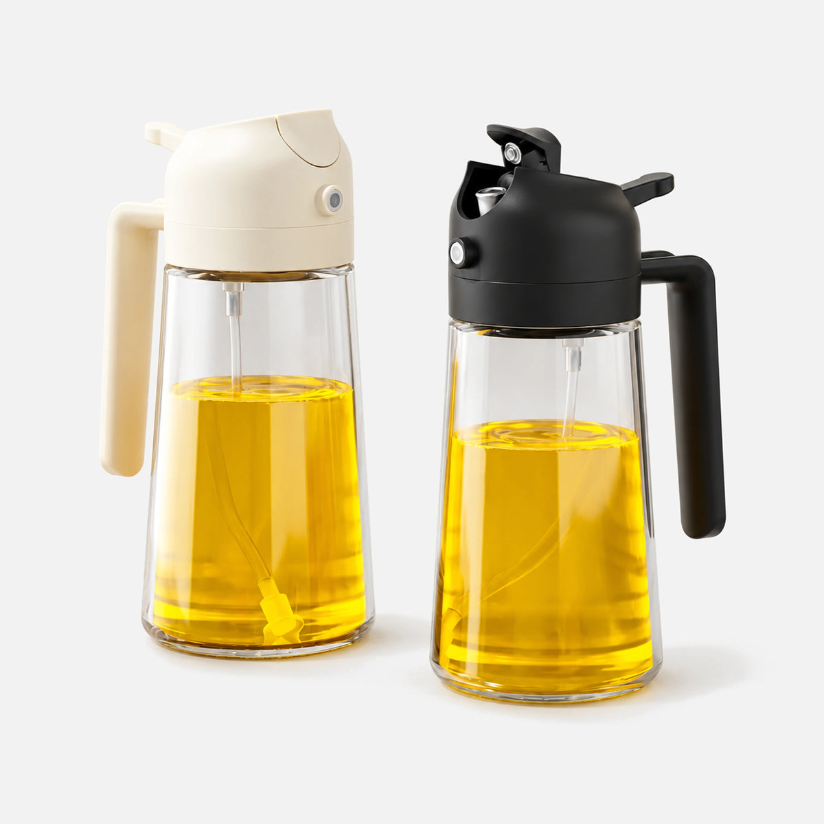 Two glass 2-in-1 oil sprayers with black and white spray heads.
