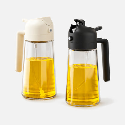 Two glass 2-in-1 oil sprayers with black and white spray heads.