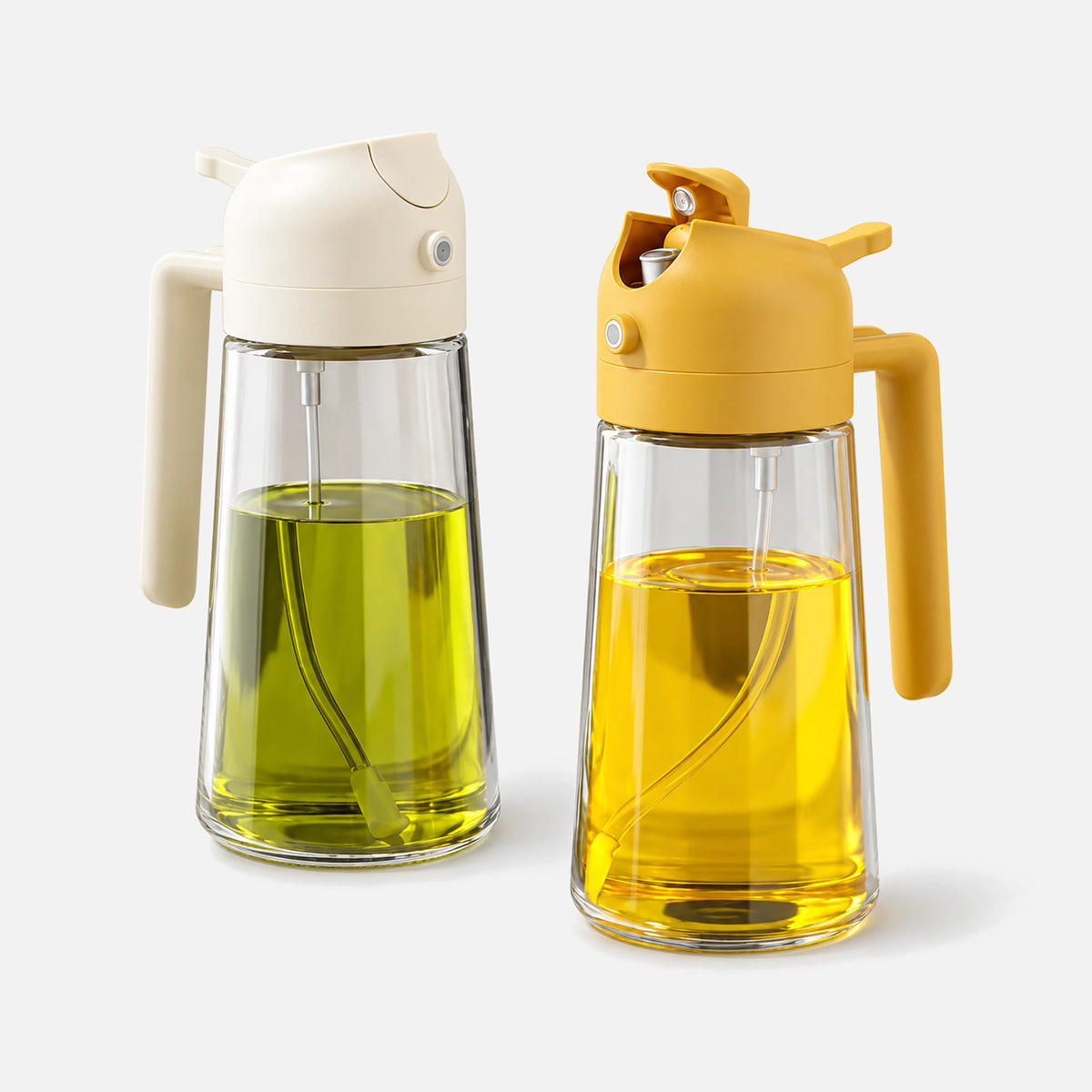 Two glass 2-in-1 oil sprayers with white and orange spray heads.