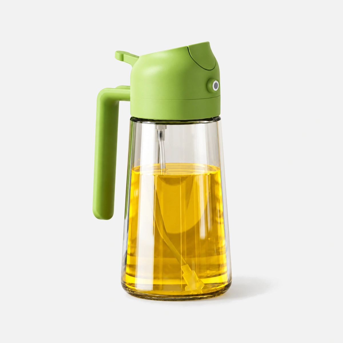 Clear glass 2-in-1 oil sprayer with a green spray head.