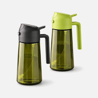 Two dark green glass oil sprayers with black and green spray heads.