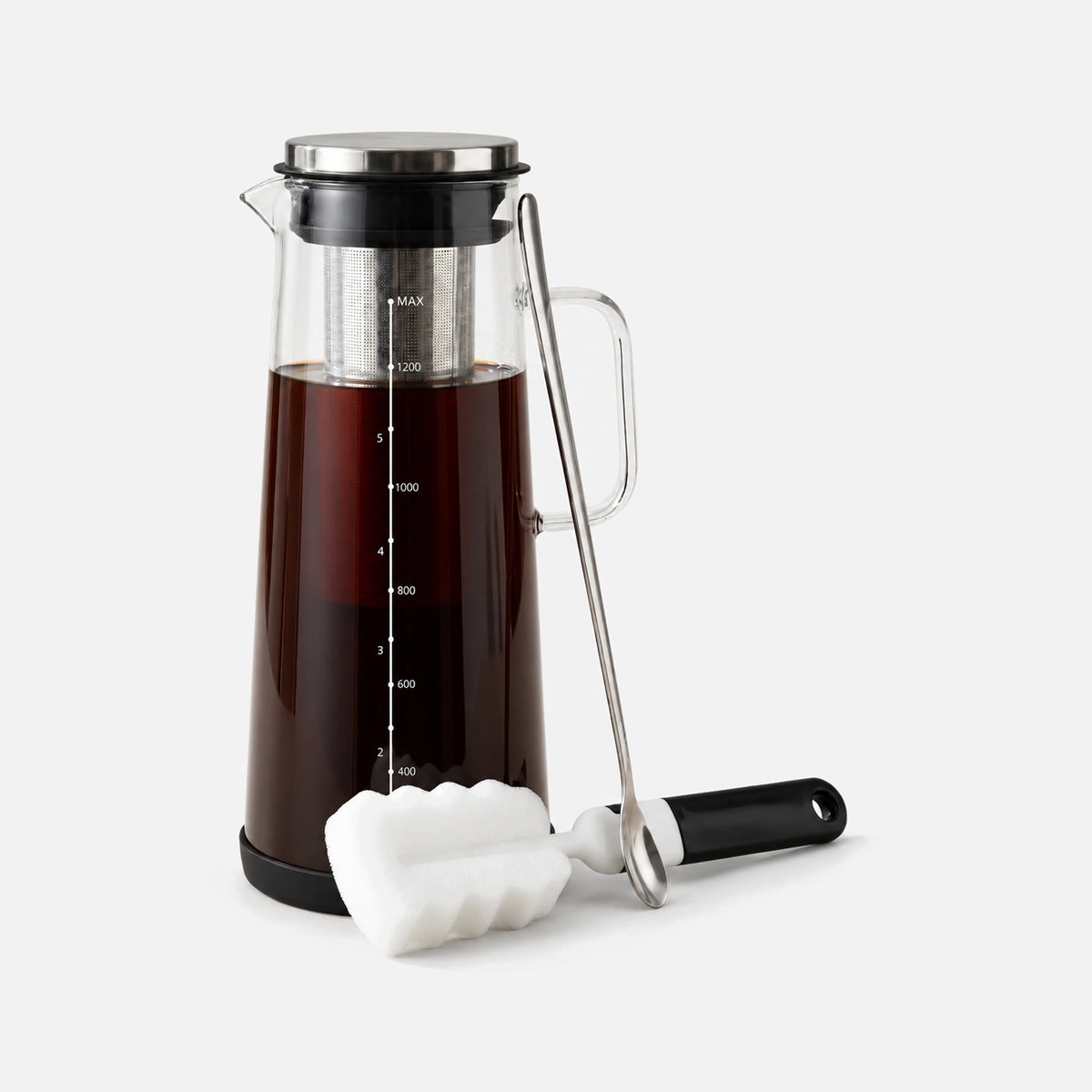 Glass cold brew coffee maker with lid and filter.