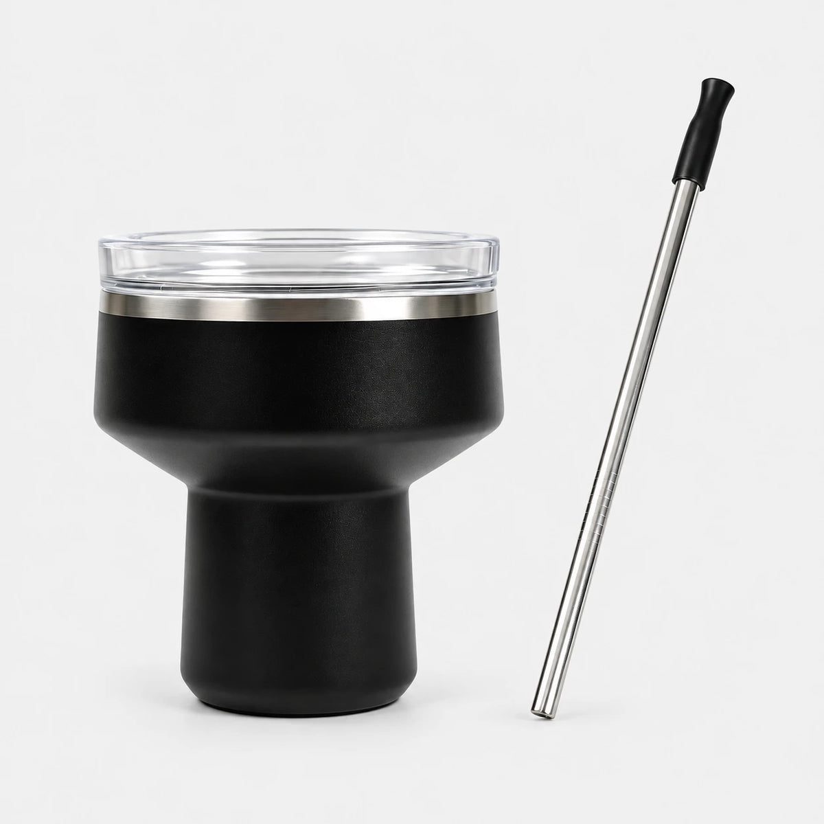 Black margarita tumbler with clear salt-rim lid and steel straw on a light gray background