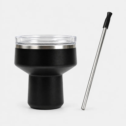 Black margarita tumbler with clear salt-rim lid and steel straw on a light gray background