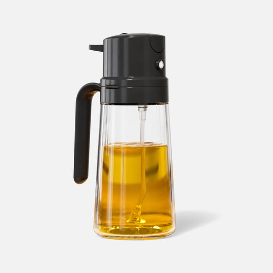 Refillable glass oil sprayer with a black head and handle.