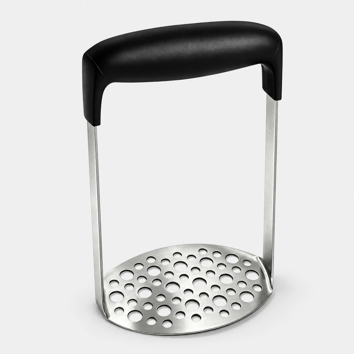 Stainless steel potato masher with a wide black handle on a light gray background