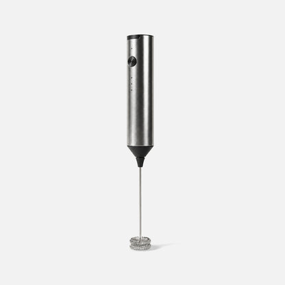 Silver rechargeable milk frother without a stand.