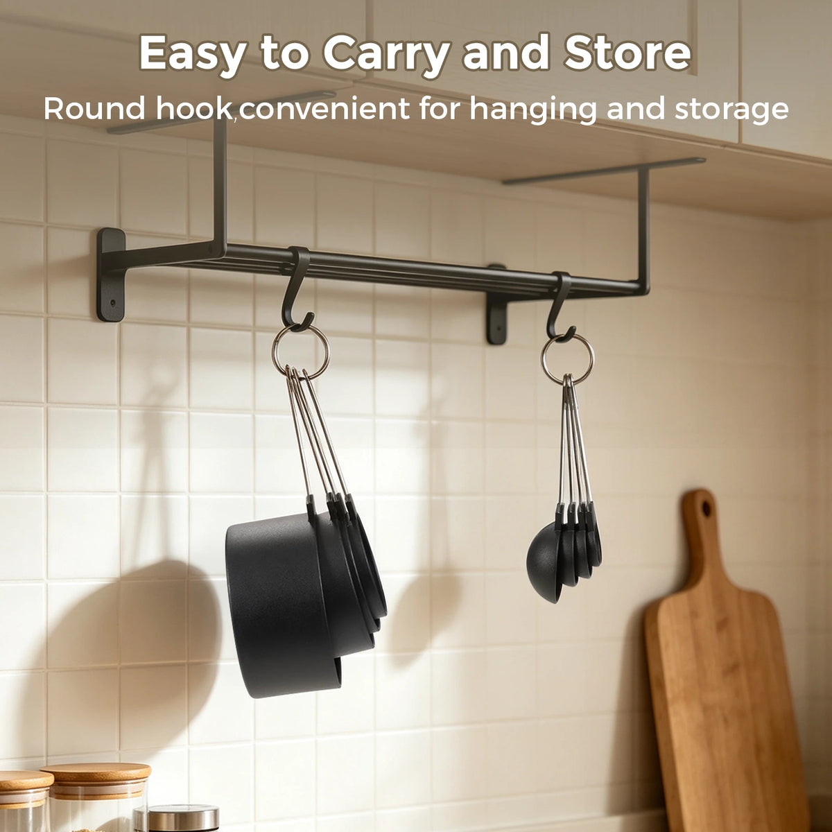 Nesting measuring cups and spoons hanging from storage rings