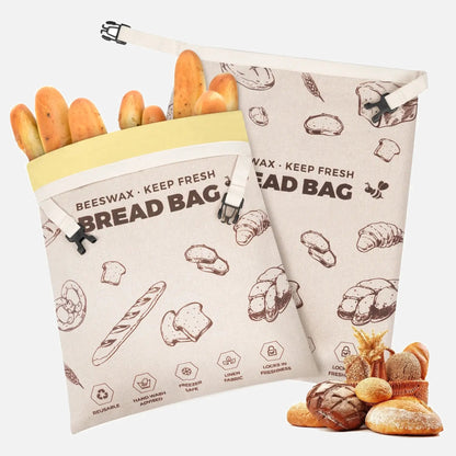Two brown patterned reusable beeswax bread bags without zippers.